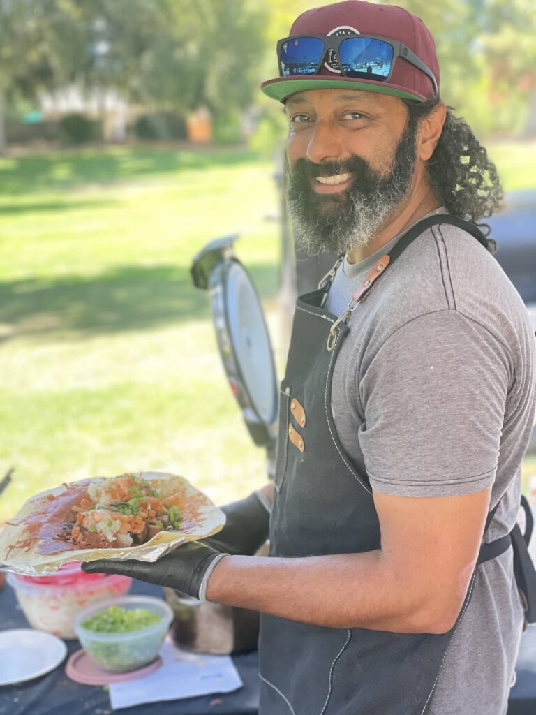 Myron prepares a big beef burrito